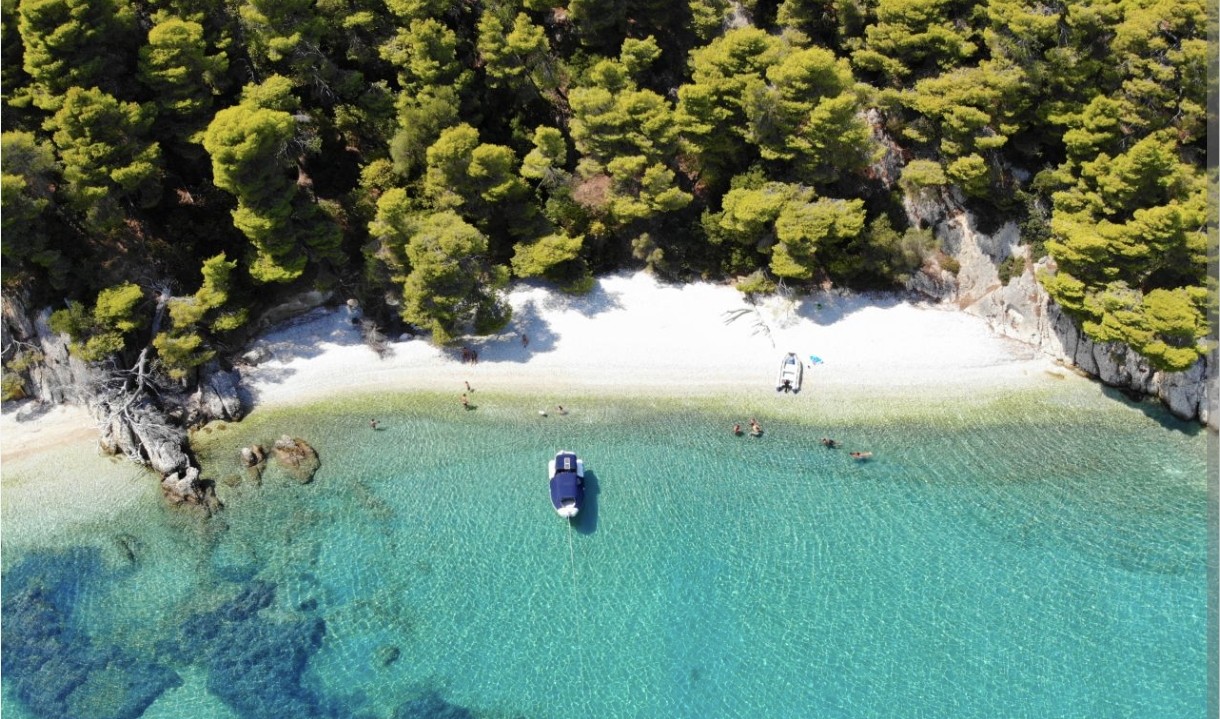 Green mountainous Kalamos island coast